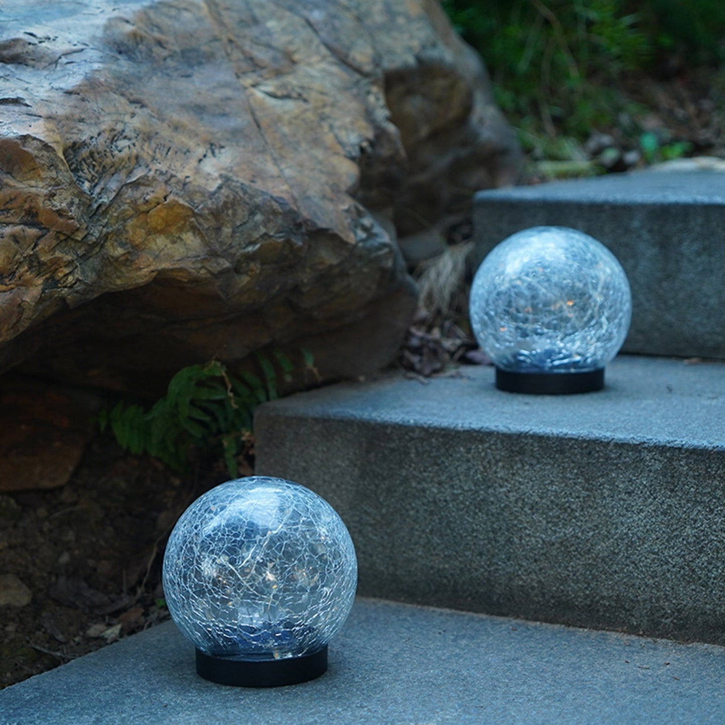 For that warm natural lights that will give your  surroundings the true feeling of home, buy our 2Pcs Solar Lights Outdoor Garden Decor Cracked Glass Ball